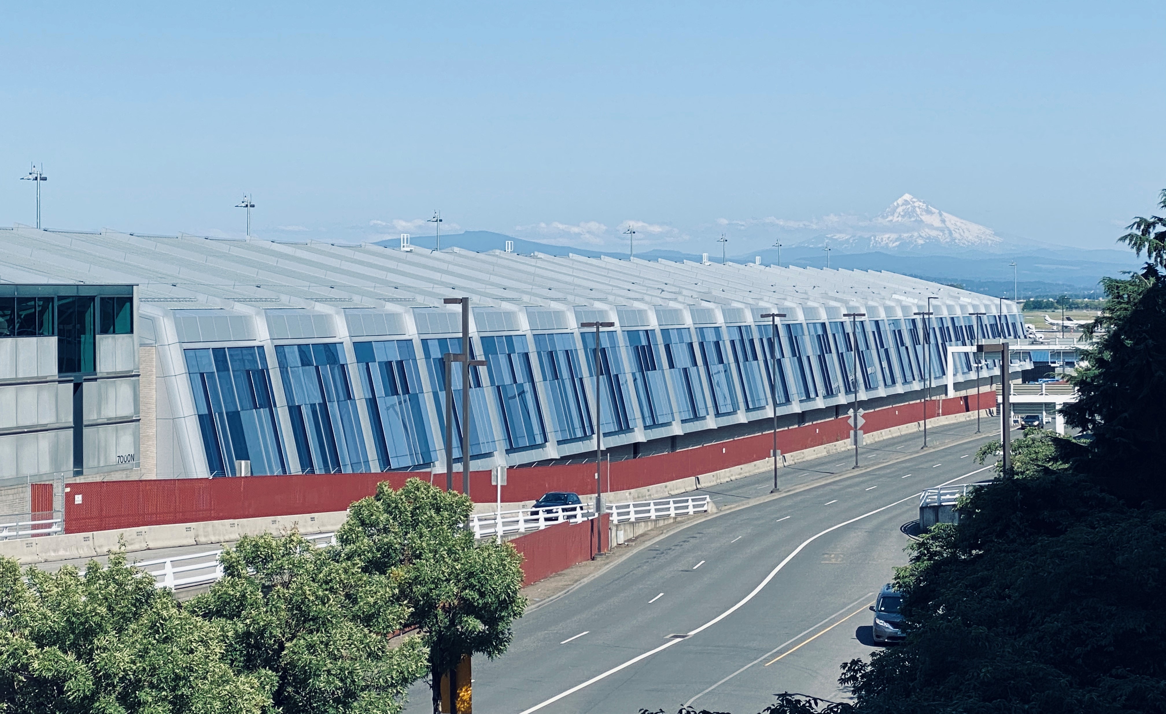 ​   Figure. 2. Sloped curtain wall at Portland International Airport, Concourse E Extension.